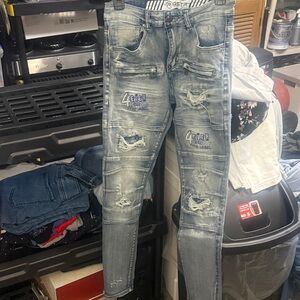 GSTR Men's Skinny Distressed Light Blue Jeans with Patch Detail